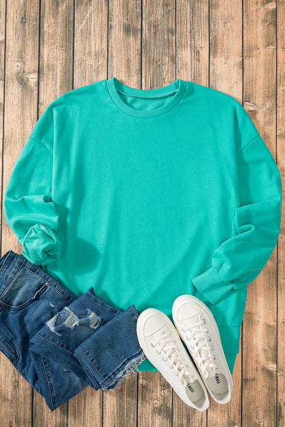 Solid O Neck High Low Hem Pullover Sweatshirt | Aruba Blue