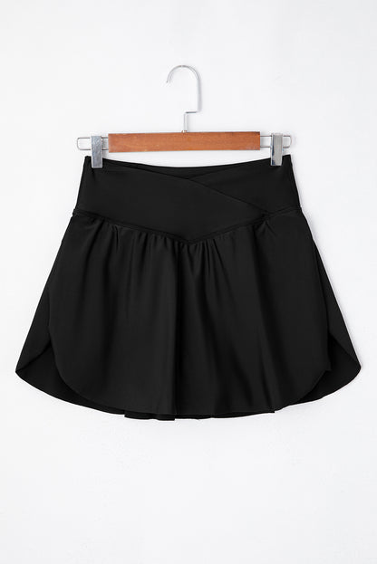 Solid Pocketed Crossover High Waist Swim Skort | Black