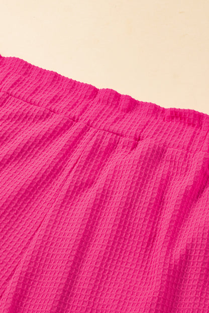 Plus Size Rolled Edge Ruffled Elastic Waist Textured Shorts | Bright Pink