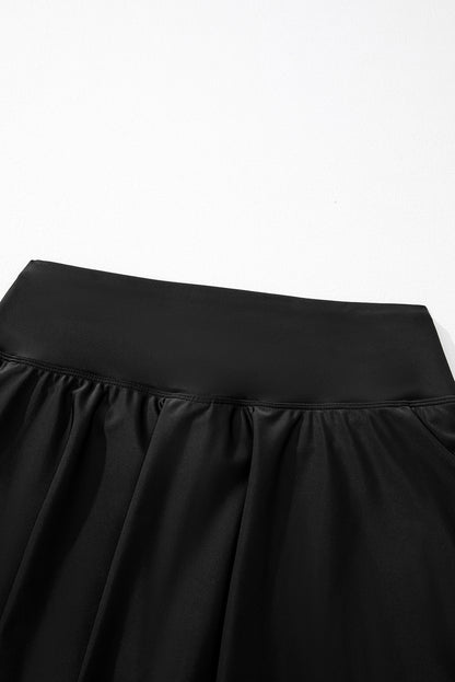 Solid Pocketed Crossover High Waist Swim Skort | Black