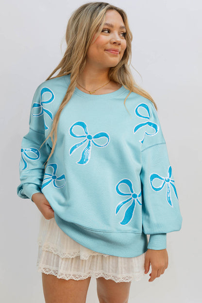 Sequined Bowknot Drop Shoulder Oversized Sweatshirt | Beau Blue