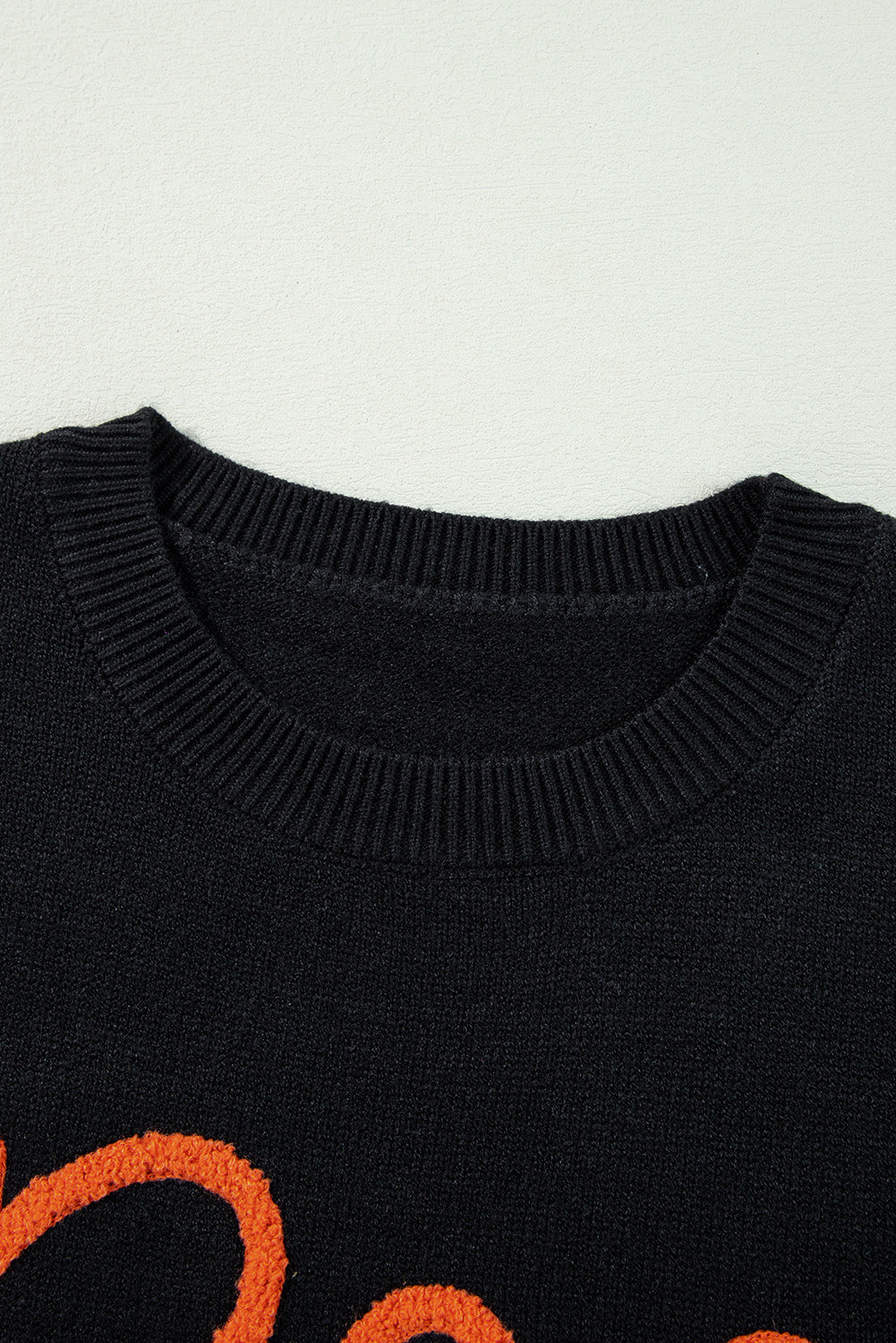 Boo Knitted Pattern Ribbed Edge Drop Shoulder Sweater | Black