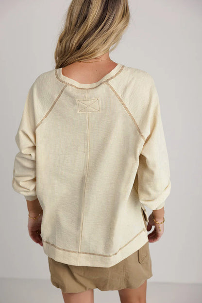 Exposed Seam Textured Knit V Neck Pullover Top | Beige