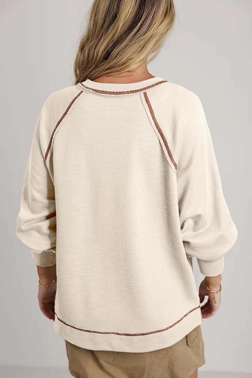 Exposed Seam Textured Knit V Neck Pullover Top | Beige