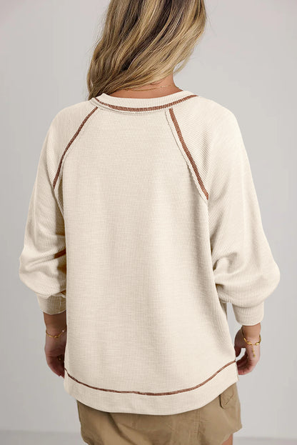 Exposed Seam Textured Knit V Neck Pullover Top | Beige