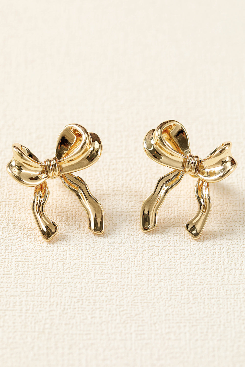 Elegant Bow Design Plated Studded Earrings | Gold