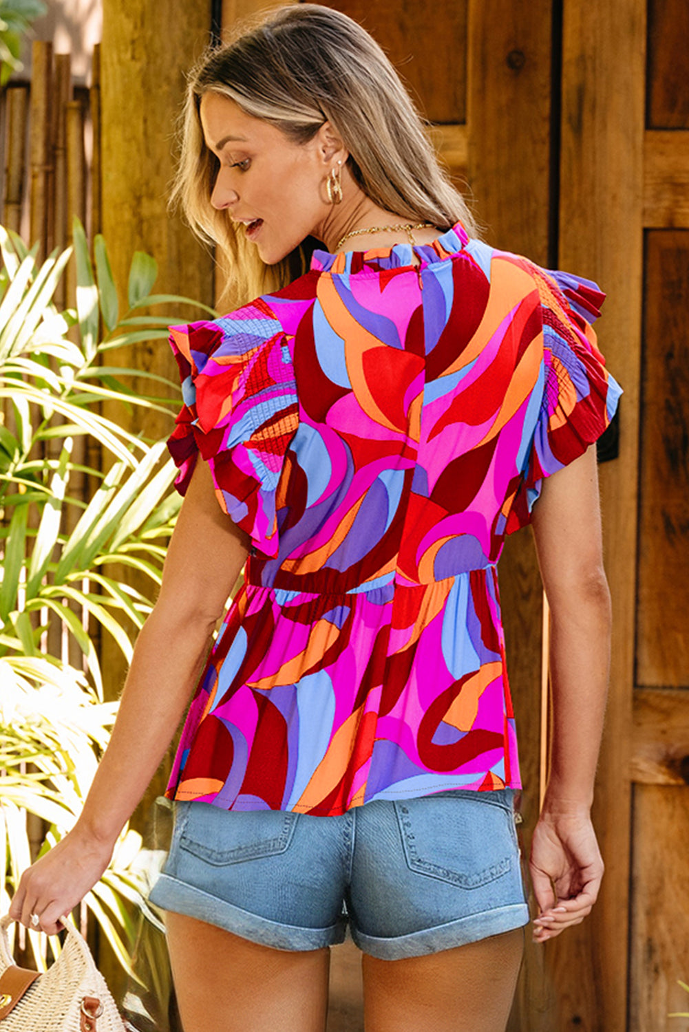 Abstract Print Flutter Sleeve Peplum Blouse | Orange