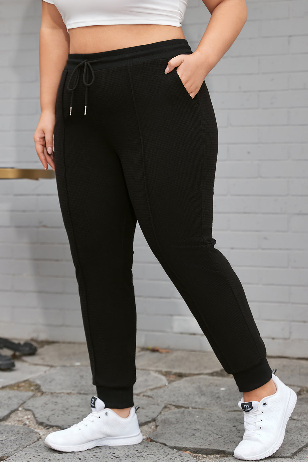 Plus Size Textured Exposed Seam Drawstring Jogger Pants | Black