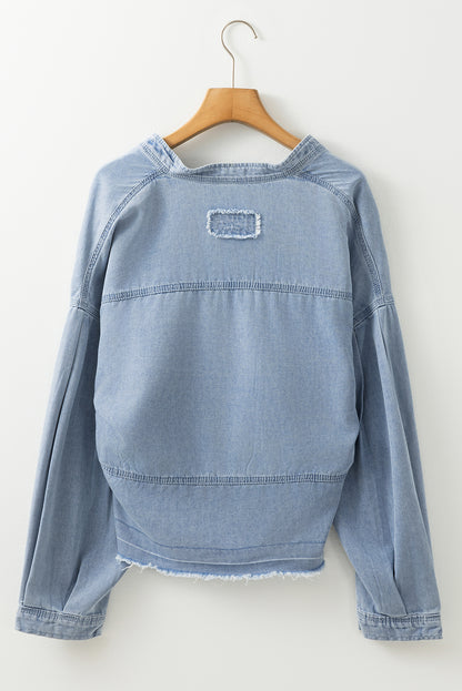 Light Wash Exposed Stitching Raw Hem V Neck Denim Top | Beau Blue