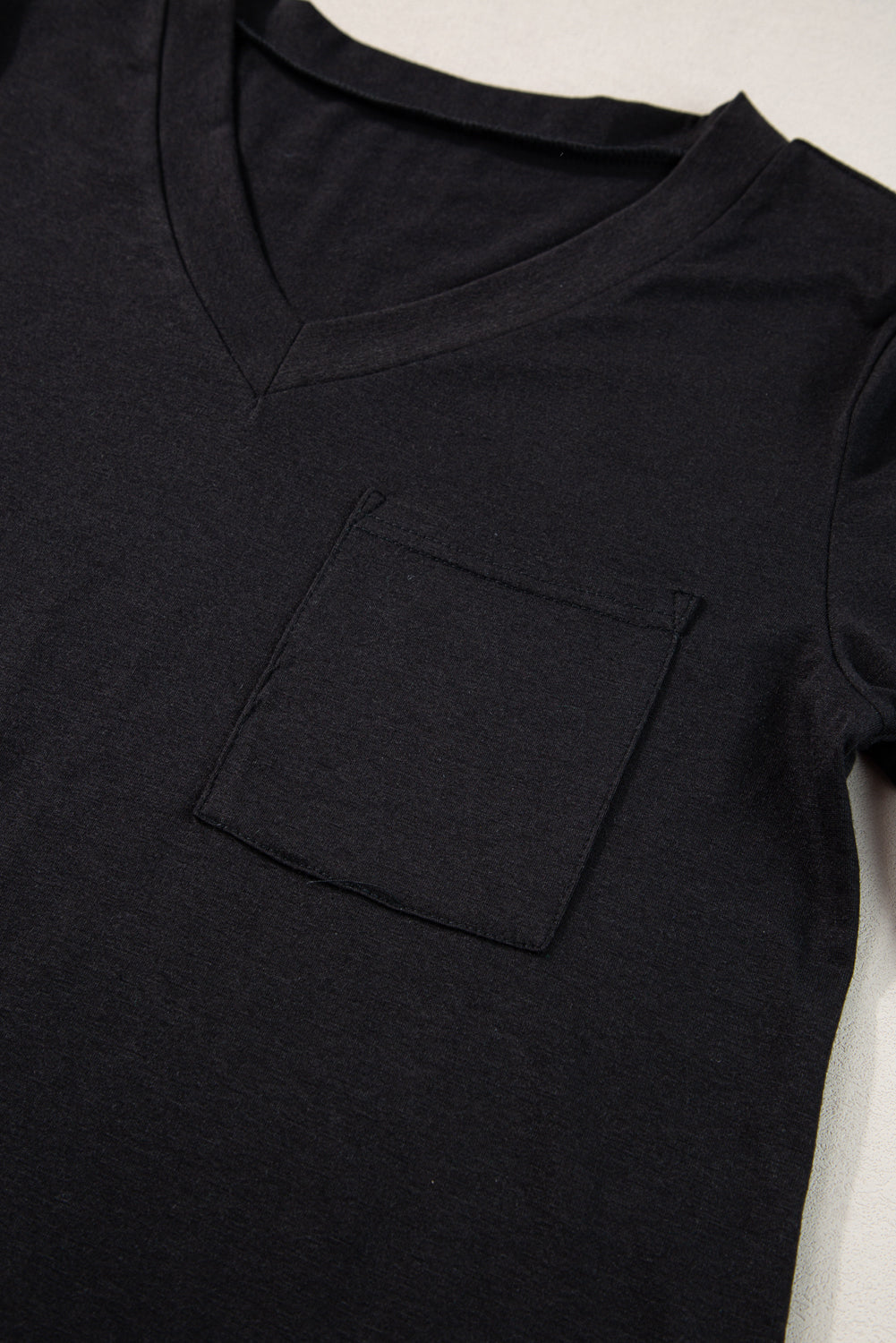 V Neck Pocketed Rounded Hem Tee | Black