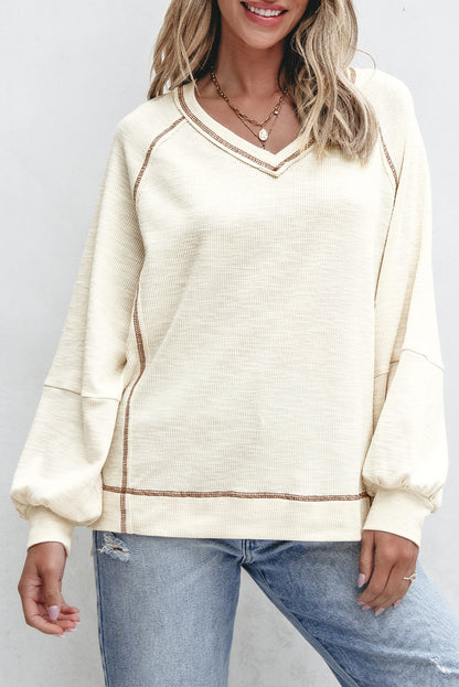 Exposed Seam Textured Knit V Neck Pullover Top | Beige