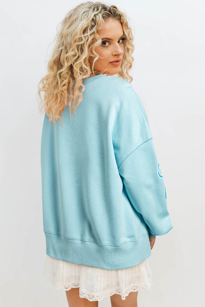 Sequined Bowknot Drop Shoulder Oversized Sweatshirt | Beau Blue