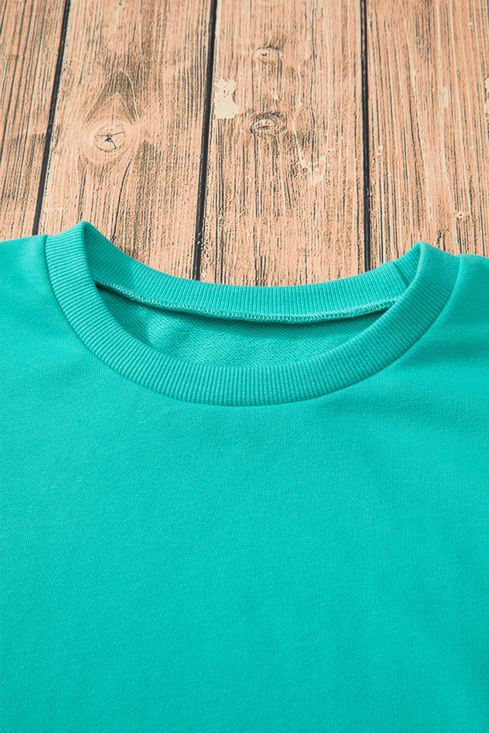 Solid O Neck High Low Hem Pullover Sweatshirt | Aruba Blue