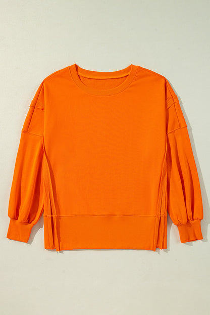 Exposed Seam Drop Shoulder Round Neck Sweatshirt With Slits | Carrot