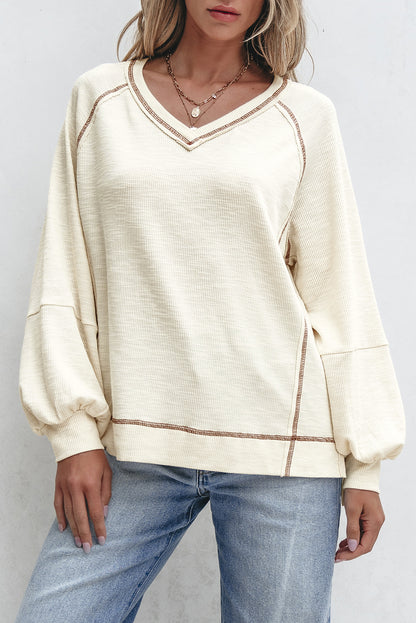 Exposed Seam Textured Knit V Neck Pullover Top | Beige