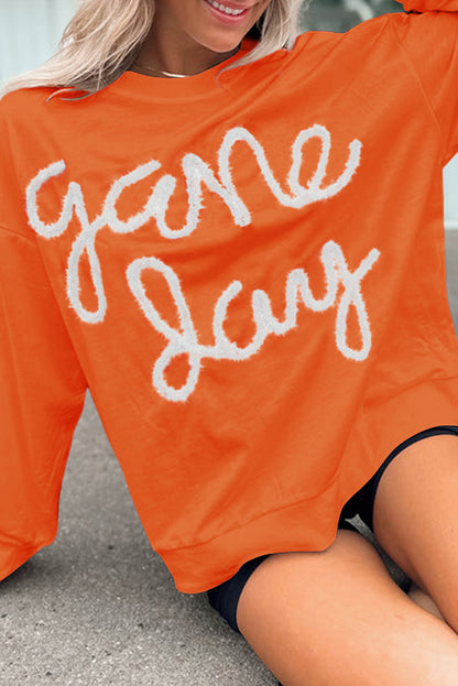 Tinsel Game Day Drop Shoulder Graphic Sweatshirt | Russet Orange