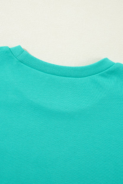 Solid O Neck High Low Hem Pullover Sweatshirt | Aruba Blue