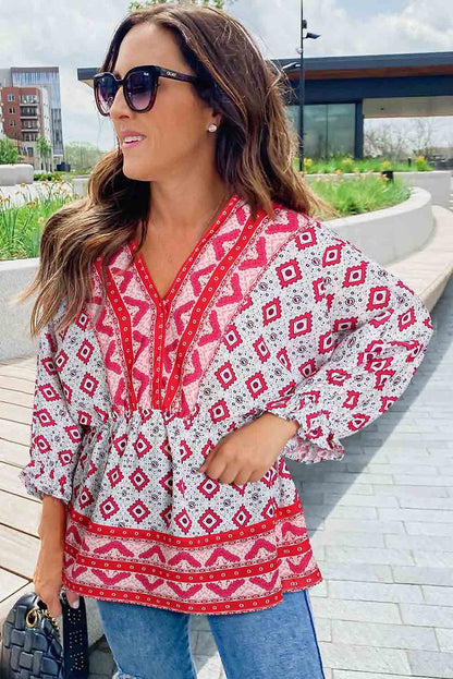 Fiery  Geometric Print 3/4 Sleeve V-Neck Shirred Waist Flared Blouse | Red