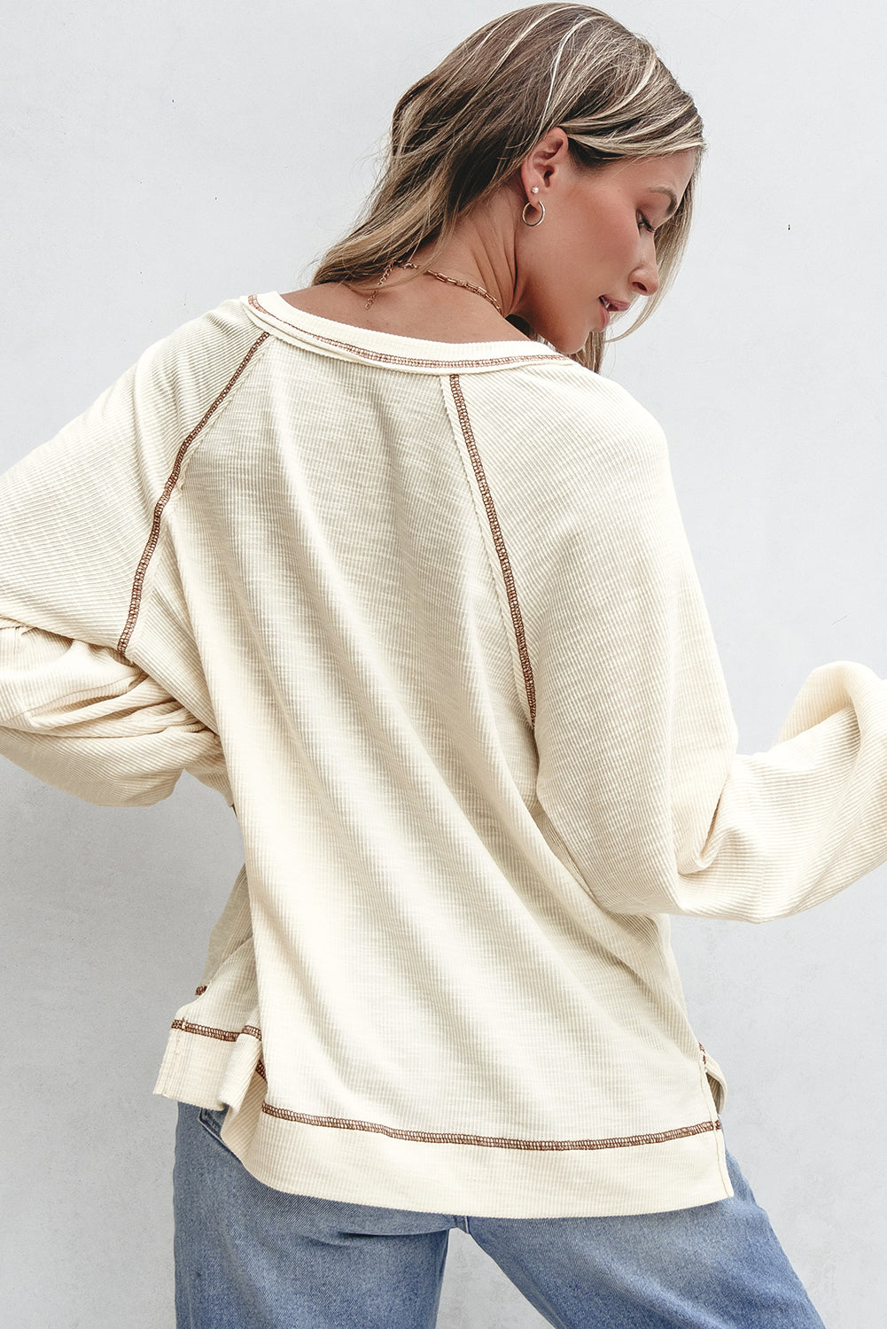 Exposed Seam Textured Knit V Neck Pullover Top | Beige