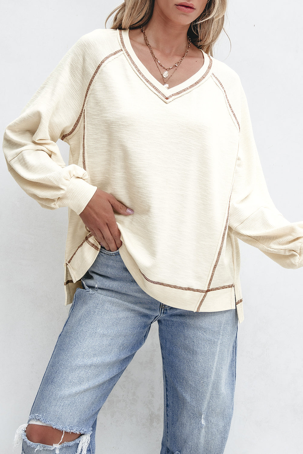 Exposed Seam Textured Knit V Neck Pullover Top | Beige