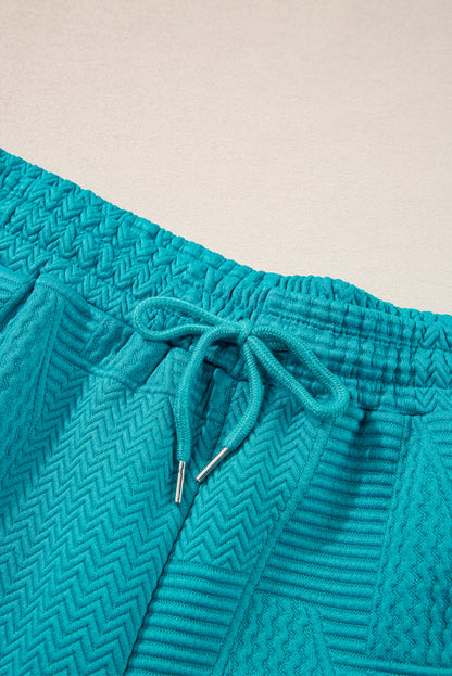 Textured Ruffle Split Top And Drawstring Shorts | Skobeloff