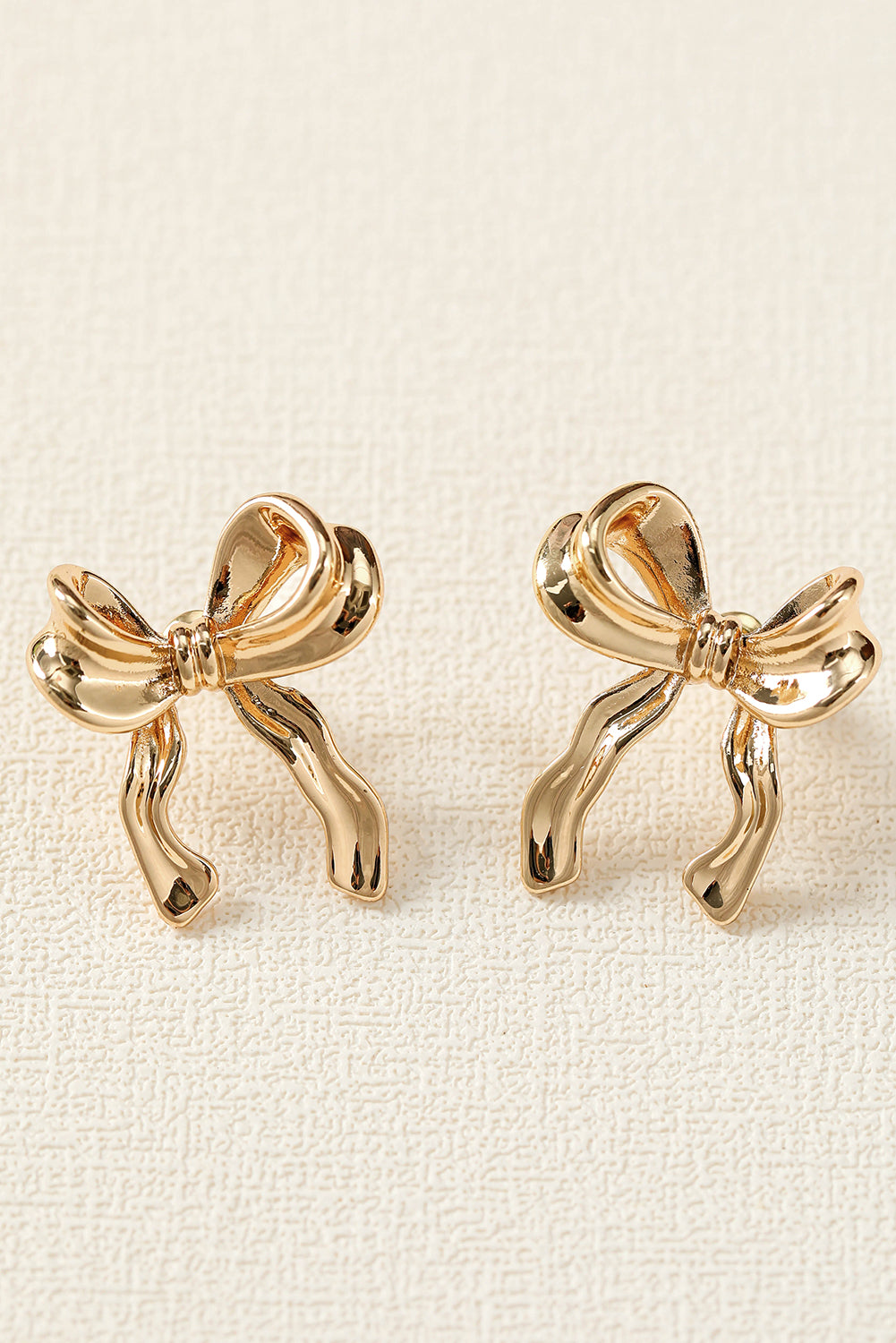 Elegant Bow Design Plated Studded Earrings | Gold