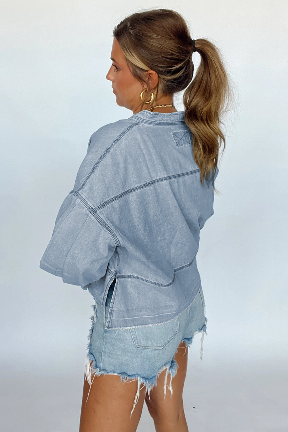 Light Wash Exposed Stitching Raw Hem V Neck Denim Top | Beau Blue