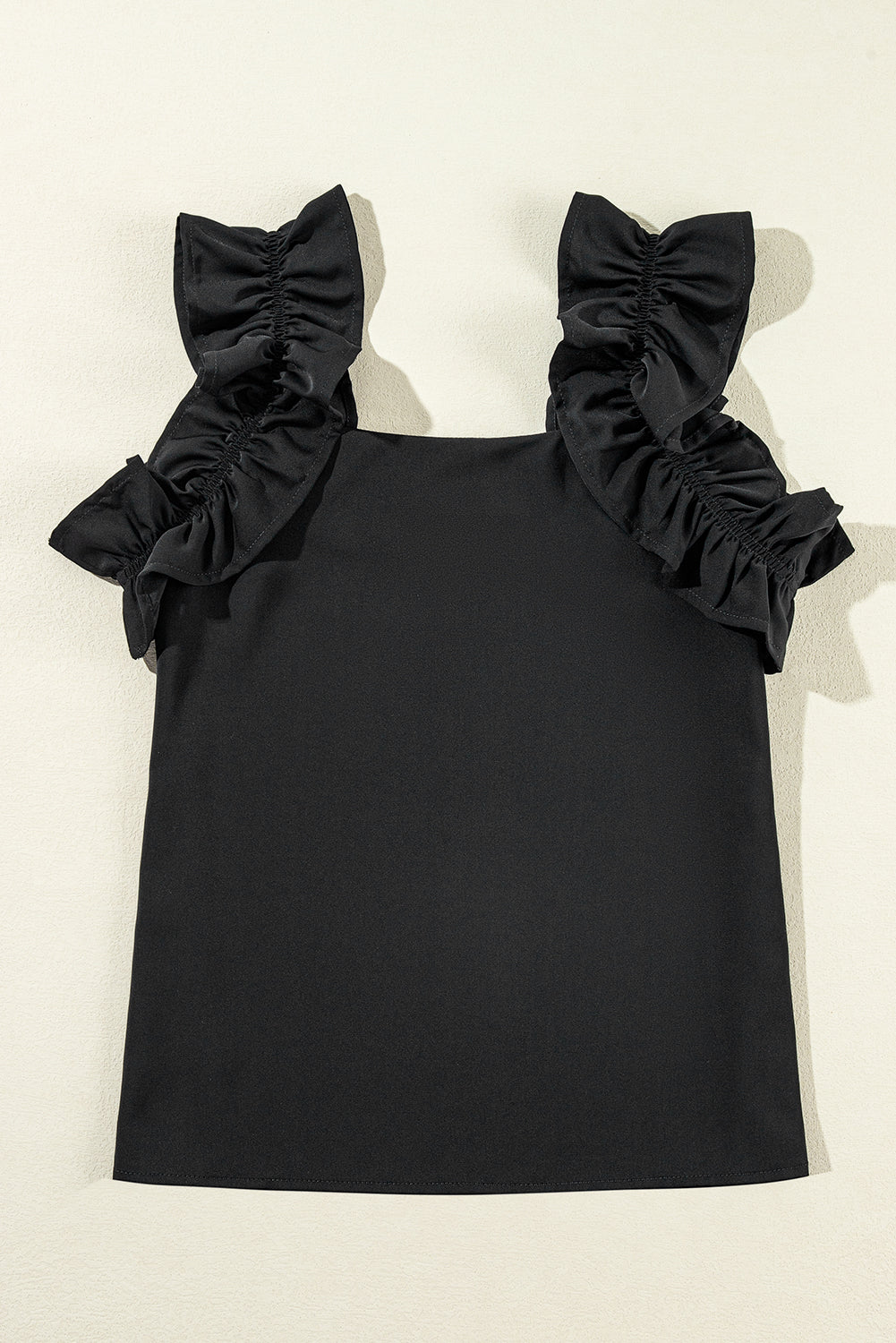 Solid Ruffle Trim Sleeveless Top | Black