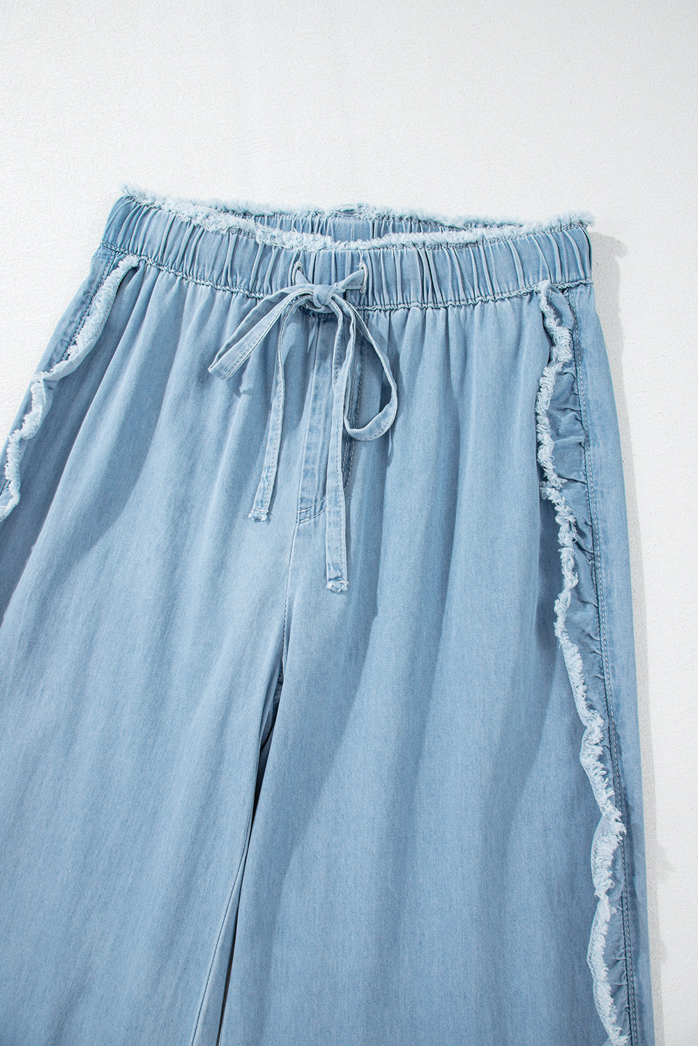 Light Wash Raw Hem Ruffled Wide Leg Jeans | Myosotis