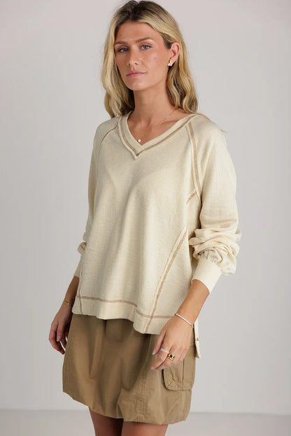 Exposed Seam Textured Knit V Neck Pullover Top | Beige