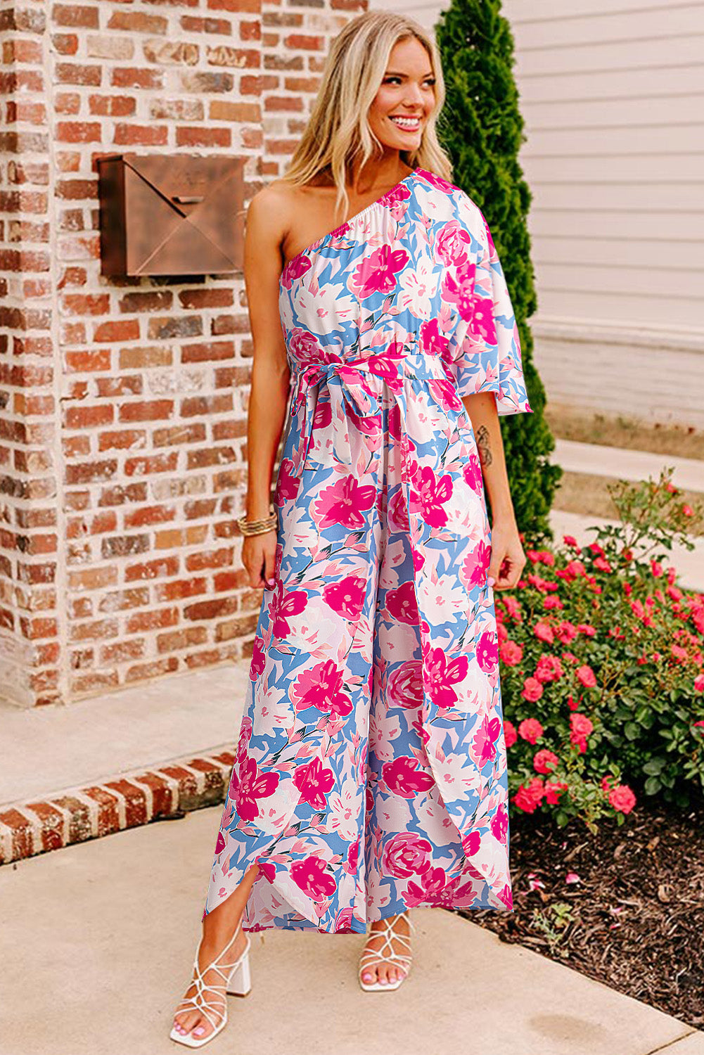 Floral Print Asymmetrical Neckline Single Shoulder Drape Sleeve Belted Jumpsuit | Pink