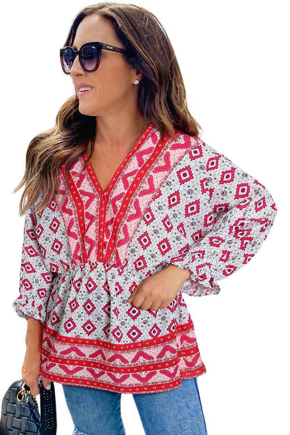 Fiery  Geometric Print 3/4 Sleeve V-Neck Shirred Waist Flared Blouse | Red